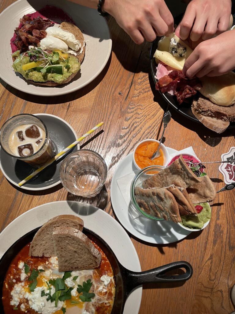 breakfast, eggs, avocado, hummus, shakshuka